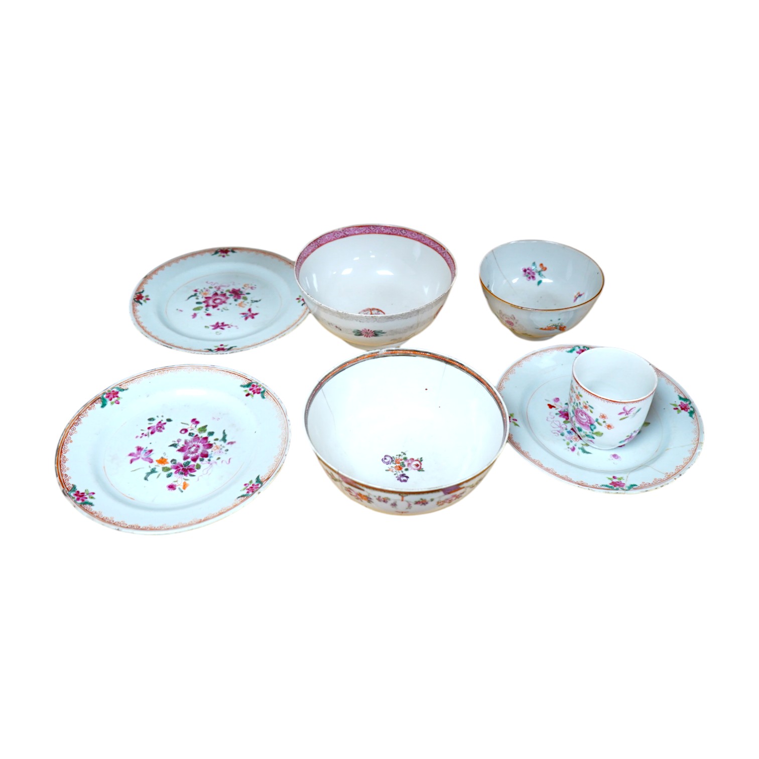 Three small 18th century Chinese export porcelain dishes, three bowls and a cup, largest 14cm. Condition - poor